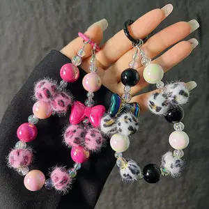 Leopard print hairball bow beaded mobile phone chain short mobile phone case bracelet lanyard wrist keychain bag chain cute charm