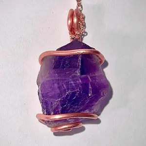 Amethyst Raw Crystal Pendant wrapped in pure copper wire, on a rose gold plated copper necklace.