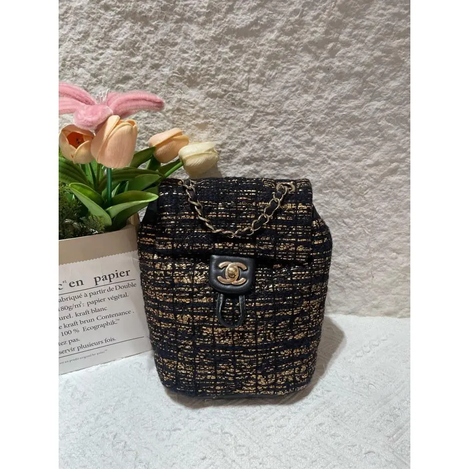 Pre-owned Chanel 2016–17 Black Metallic Tweed Drawstring Backpack 20836528