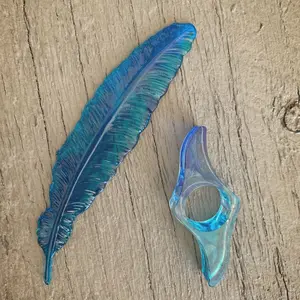 Feather bookmark and thumb page holder