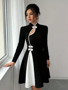 A women's black and white fashionable spliced cheongsam style long sleeved skirt, with a long sleeved design that is sun resistant and elegant. It is suitable for commuting to work, shopping and outdoor activities, indoor and outdoor dressing, Womenswear
