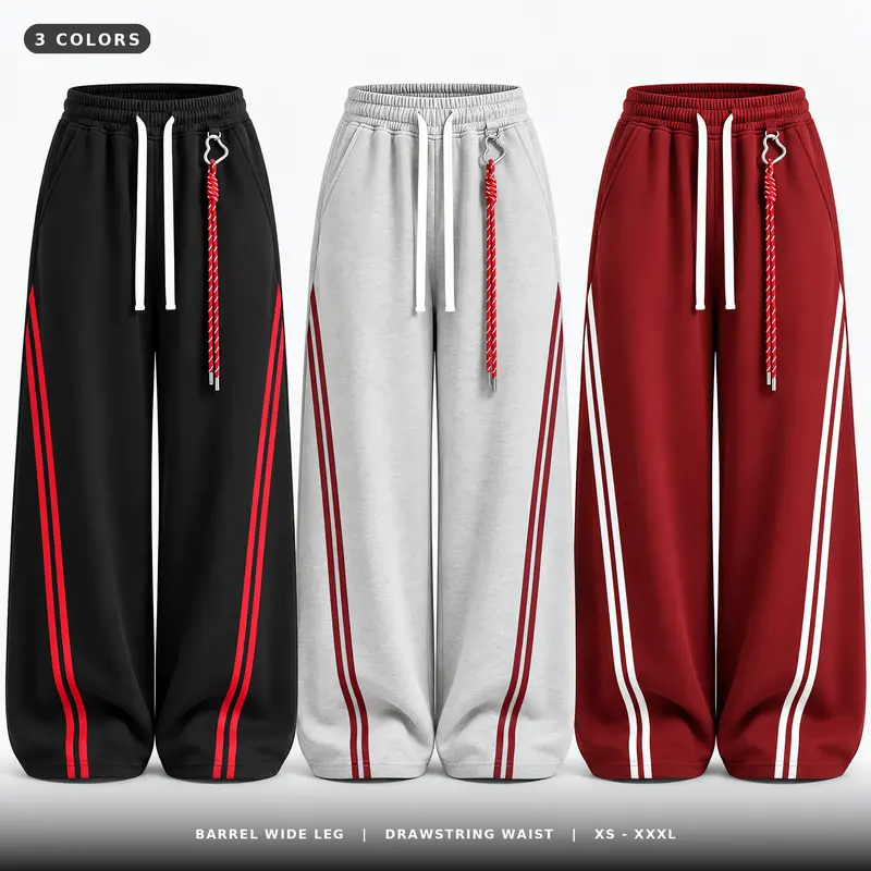 Plus-size women’s wide-leg athletic pants, available in three colors, featuring barrel-shaped legs, side stripes, and a drawstring waist.