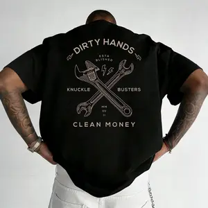 "Dirty Hands, Clean Money" wrench graphic t-shirt, workwear-style graphic print t-shirt, comfortable fabric short-sleeved top.