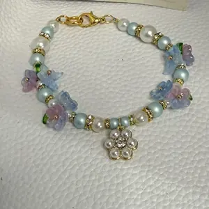 Female Fashionable Handmade Bracelet with Pearl Flower Charm, Butterfly Charm, and Blue-White Beads, Fashion Jewelry Accessory