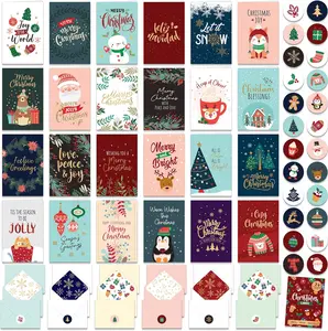 Decorably 24 Pack Foiled & Glittery 6X4In Assorted Box Christmas Cards with Envelopes and Stickers, 24 Festive Designs Christmas Card Set with Printed Message Inside