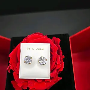 Broquel piedra blanca oro 14k