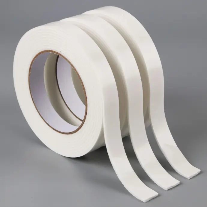 White double sided adhesive tape delivers stable sticking power, perfect for photo display, decor fixing and various DIY handmade work.