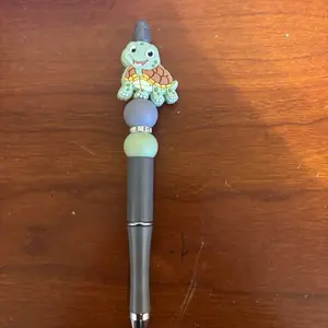 Green Turtle Pen with Colorful Bead and Character Design
