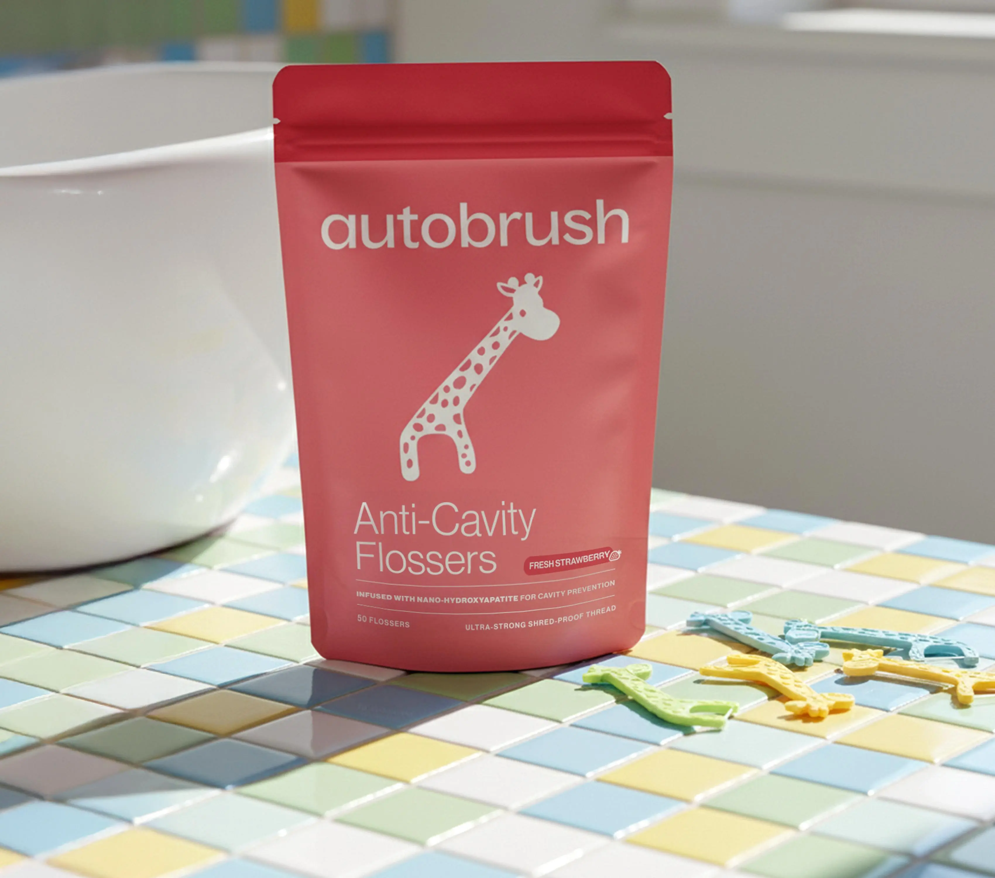 Autobrush Anti-Cavity Flossers | NanoHAP-Infused | Kids Giraffe + Adult Charcoal | 50 Count | Shred-Proof Thread