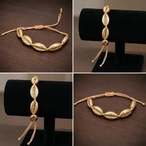 Gold Tone Cowrie Bracelet