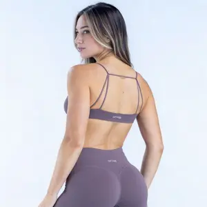 DF VISION Twist Front Sports Bra |   Medium Support V-Neck Yoga Top with Adjustable Sliding Straps & Removable Pads.