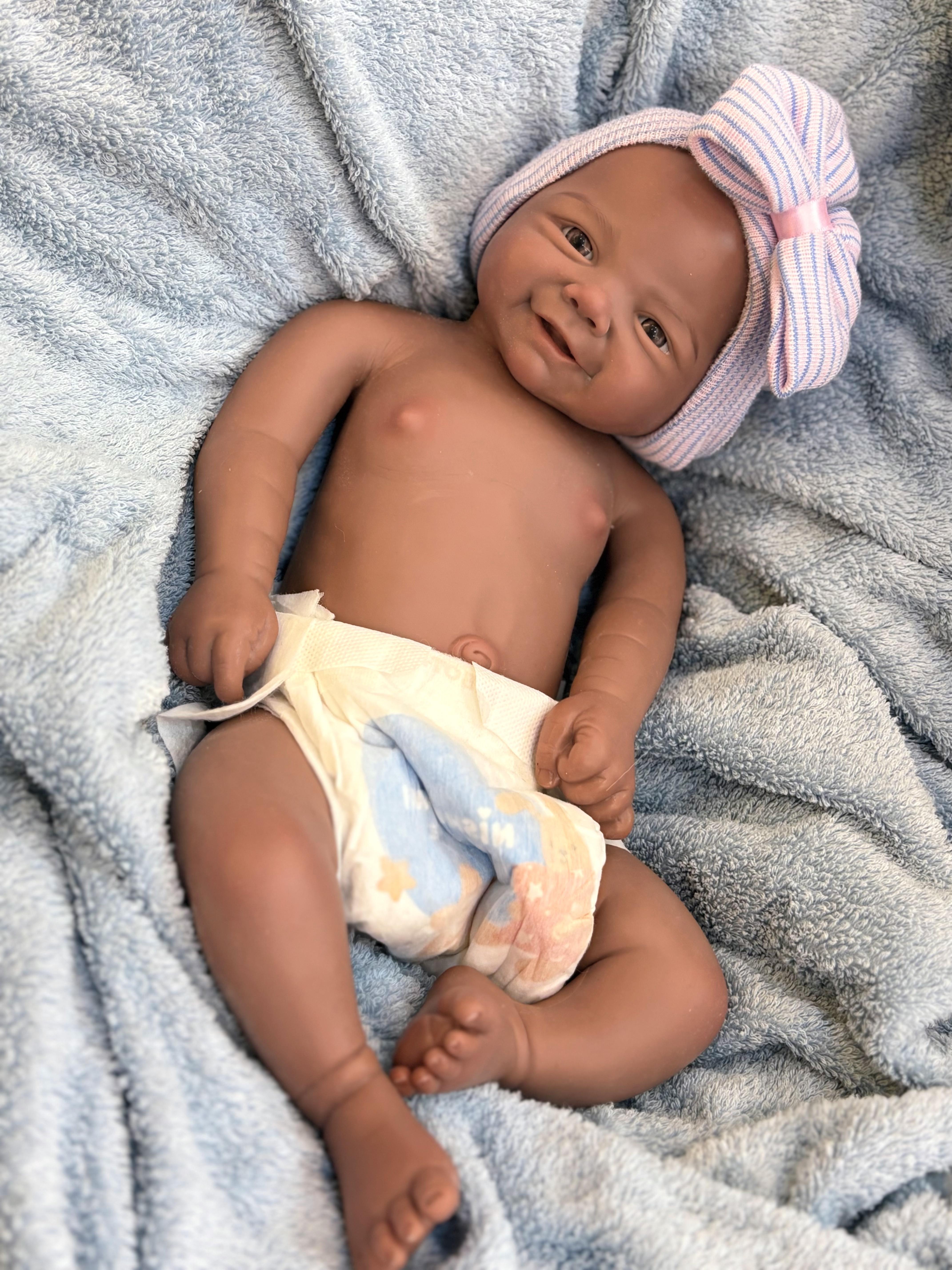 Reborn Doll Soft Silicone 18 inches Lifelike with Happy Smile Brown Skin Soft Body Realistic Details Includes Comfort Item Bottle Birth Certificate Perfect for Birthday Gifts Collectors and Children