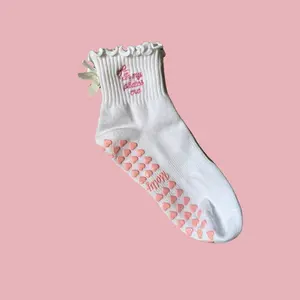 In my Pilates era white & pink grip sock with white bow and pink heart grips for pilates, barre, yoga or lagree
