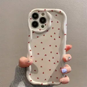 This white cream-patterned phone case features a full-screen display of small red hearts and is compatible with Apple iPhone 17/16/15/14/13/12/11/X/XS/XS Max and other models. It's the perfect holiday gift for friends, family, and yourself.