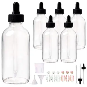 6 Pack 4oz Clear Glass Bottles with Glass Eye Droppers for Essential Oils, Perfumes & Lab  (Brush, Funnels, 2 Extra Droppers, 12 count Labels & Measuring Cup Included)