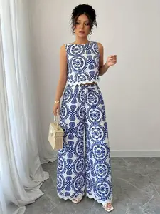 Elegant Chic Two-Piece Set Womenswear, Sleeveless Top with Ruffle Details, Wide-Leg Pants, Printed Design, Perfect for Vacation Style