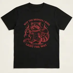 Funny Raccoon Graphic Tee: Burning Bridges Quote Shirt