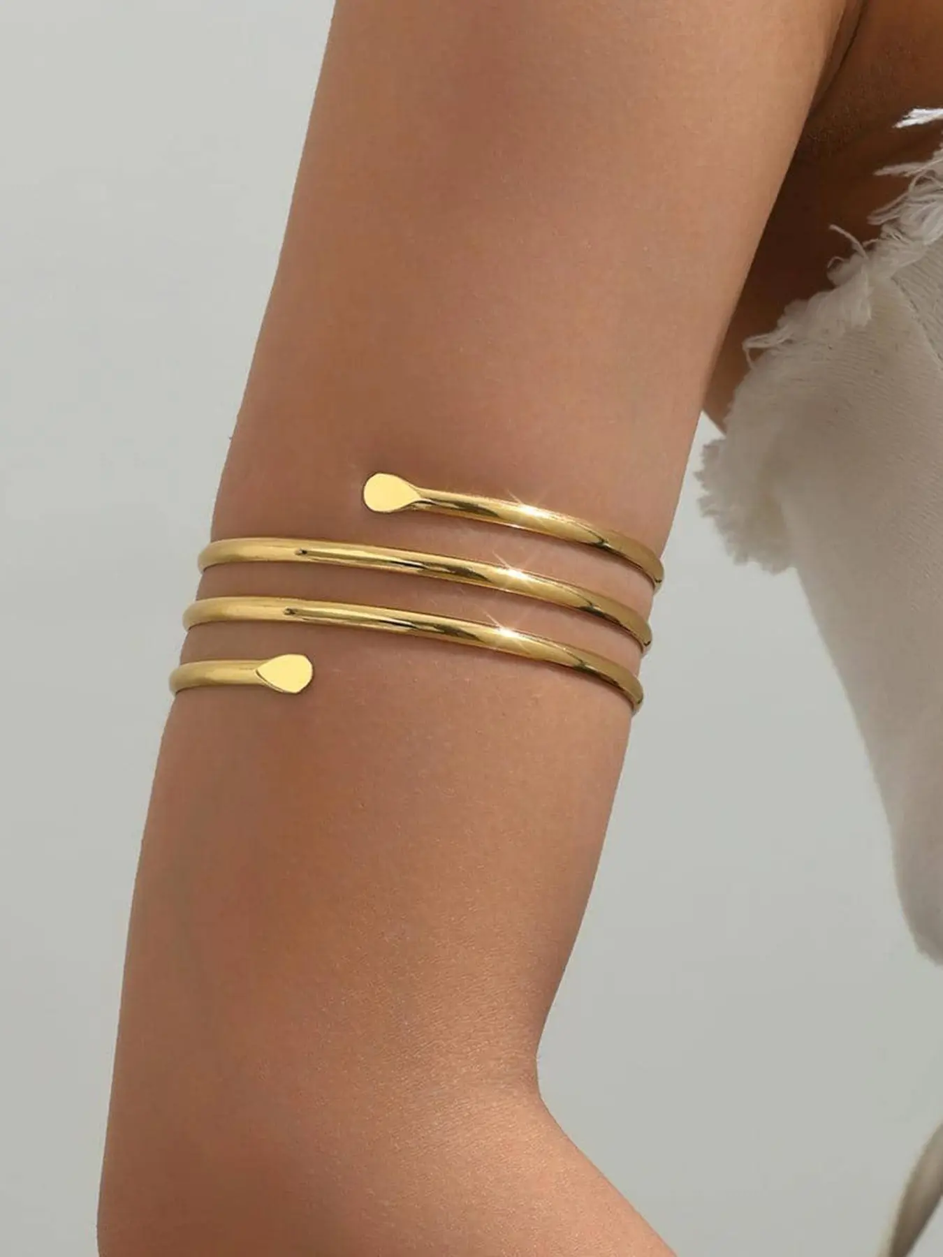 Adjustable Vintage Multi-Layer Gold-Tone Metal Armband — Minimalist Teardrop-Shaped Open Upper Arm Cuff — Stylish, Smooth Metal Arm Bracelet — Aesthetic Vintage-Style Irregular Jewelry for Women — Graduation Party Gift Adjustable Bangle