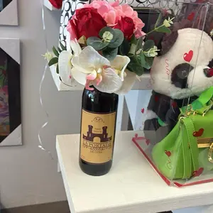 Decorated wine bottle with flowers