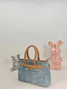Blue brown denim diagonal cross rest handbag
