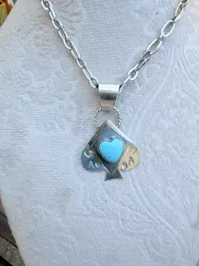 Turquoise gambling pendant
