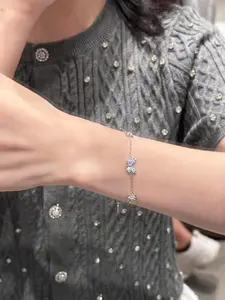 Luminous Butterfly Charm Bracelet for Women Glow-in-the-Dark Magical Sparkle Light-Capturing Material Blue or Purple Halo Adjustable 7-8 Inch Perfect for Parties and Everyday Style