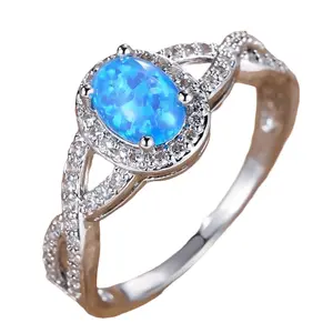 Artistic Retro White K Egg-shaped Blue Opal Edge White Diamond Lace Ring in Platinum Blue Opal Electroplated Copper with Sizes 6-11 for Women