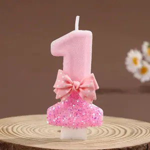 0 to 9 “Girl-Next-Door” Pink Polka Dot Bow Birthday Number Candles – Perfect for first birthdays, creating a party atmosphere and decorating cakes. These candles are the ideal choice for setting the mood.