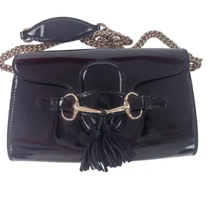 Pre-owned GUCCI leather Crossbody Bags black patent horsebit chain crossbody bag with tassel detail. qg567