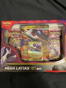 Pokemon TCG Mega Evolution Mega Latias EX Box - 4 Booster Packs & EX Promos - Official Trading Card Game - Mega Latias EX Cards for Collectors