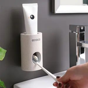 Eco-Friendly Automatic Toothpaste Dispenser, Wall-Mounted and Simple Adhesive Design for Bathroom, Ideal for Home Use