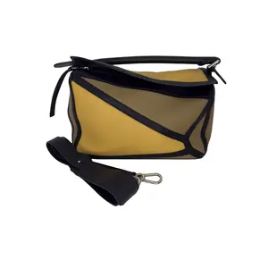Pre-owned Loewe Used Puzzle leather handbag, yellow khaki patchwork, with an extra crossbody strap