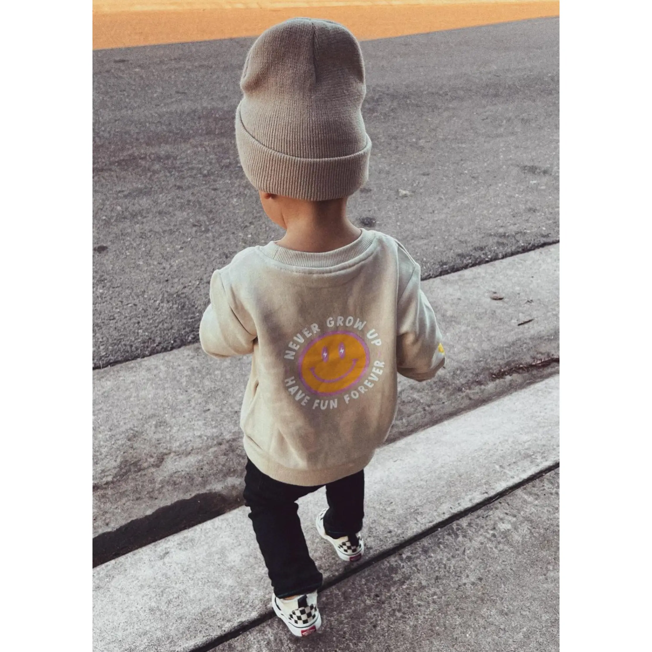 Never Grow Up Crewneck