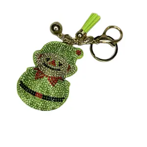 e.l.f. Keychain Jewelry - Stylish Green Glitter Keychain with Red Bow, Gold Clasp, Festive Holiday Event Bag Charm