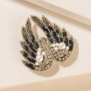 Myra Guardian Angel Brooch in Platinum Night