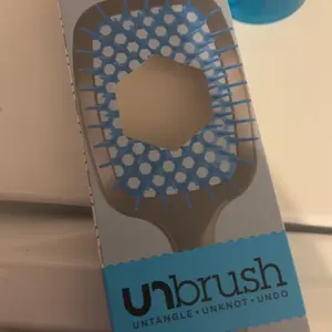 Product Review of Unbrush Detangling Hair Brush by FHI Heat from B**i **