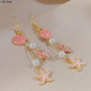 Ocean Style Starfish & Shell Drop Earrings, long pearl design in soft pink. Sweet summer jewelry, trendy accessories for beach holidays, travel and daily casual wear