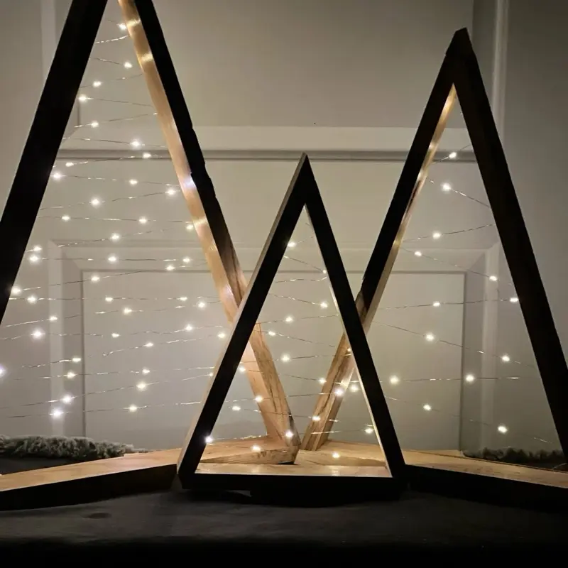 Rough Sawn Oak Christmas Tree with lights for festive and warm holiday ambiance.