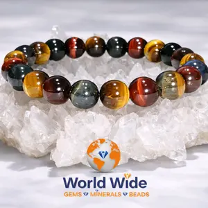 Natural Multi-Color Tiger Eye 8mm round bracelet featuring golden, red, and blue tones. Known as a stone of protection, confidence, and strength. Stretch fit, polished, and ready to wear.