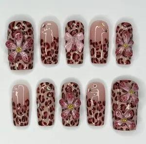 Chic Leopard Print 3D Flower Nails, Trendy Dark Red Animal Print Press On Nails, Long Square  Gel Art with Kawaii Pink Ribbon & Gold Accent Embellishments,  Edgy Autumn Winter Nail Design.