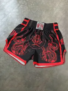 Dragon Graphic Muay Thai Shorts with Gold Trim | High Waisted MMA Kickboxing Workout Trunks for Men & Women | Retro Streetwear Baggy Gym Shorts for Boxing Training & Summer Rave Outfits