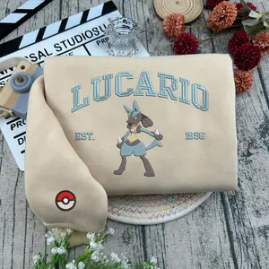 Cool Lucario Pokem0n Embroidered Sweatshirt, Peluche Lucario PKM Matching Emdroidery Sweatshirt, Full PKM Characters Collection Sweater, Matching P0kemon Clothing. Trendy Unisex Crewneck Sweater For Men And Women, New Year's Gifts
