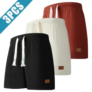 Men’s 3-pack solid-color shorts featuring a drawstring elastic waistband; loose, comfortable, sweat-wicking, breathable shorts with a relaxed vibe—ideal for everyday wear and beach/sand activities.