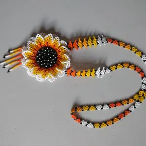 Coloridos Collares Artésanos de Shakiras - Flower Design with Orange, Yellow, and Black Accents, Handcrafted Beads