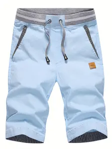 Men’s faux two-piece patchwork casual shorts with a drawstring waist and affixed label; summer cropped straight-leg beach, casual sports, and everyday bermuda shorts