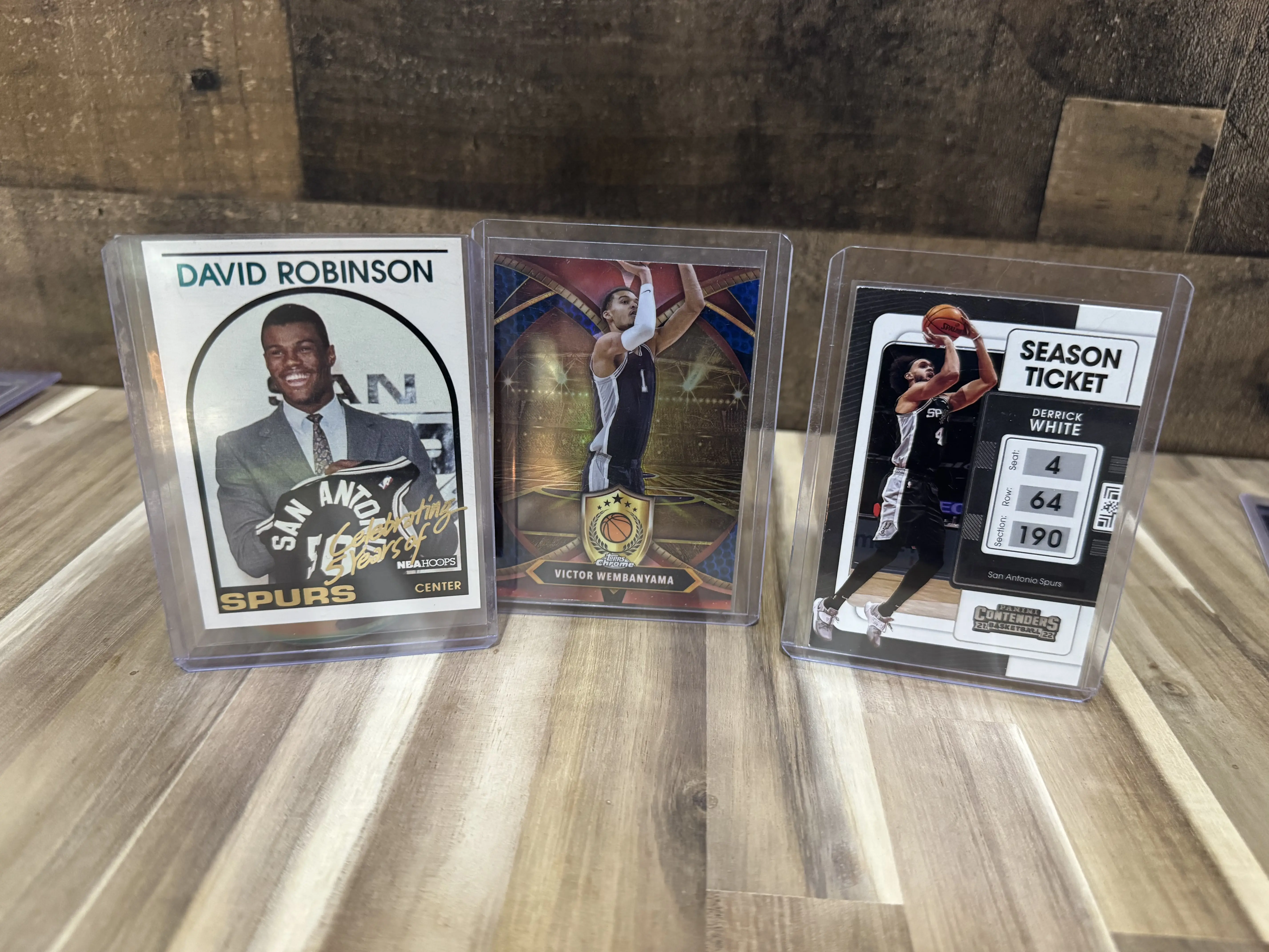 Victor Wembanyama, Derrick White,  David Robinson
