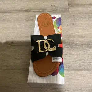 Women's Footwear - Elegant Brown Sandals with Gold DC Logo for Girls - Shoe