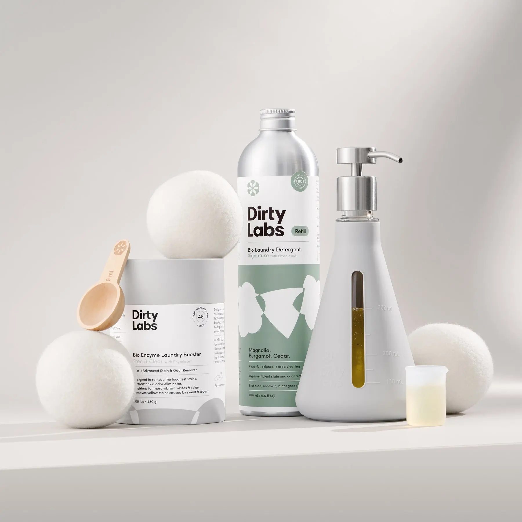 Sustainable Laundry Starter Set - Signature Scent - Laundry Detergent (80 Loads), Booster (48 Loads), Dryer Balls (3 Pack), and Refillable Pump