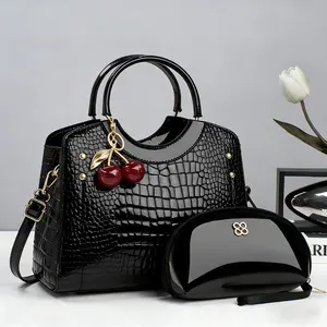Medium Size Women's 2-Piece Handbag Set with Sleek Crocodile-Embossed Glossy Leather Appearance & Playful Cherry Charm with Gold-Tone Leaf