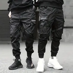 Men's solid color tactical work pants with durable multi pocket drawstring design, outdoor training pants, hiking and mountaineering